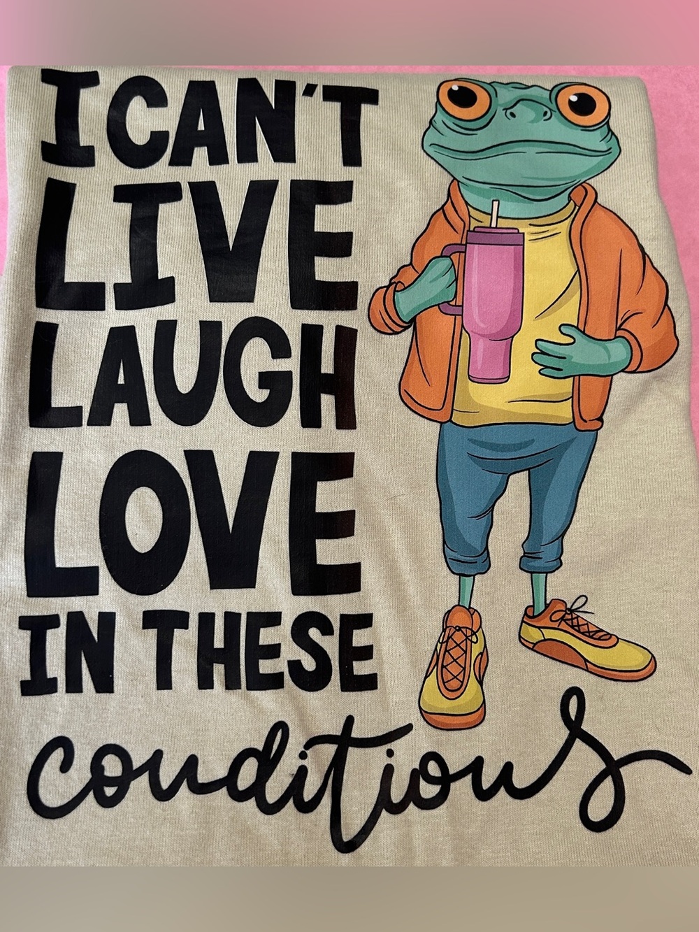 Gildan Tee “ I can’t live , laugh , love in these conditions “